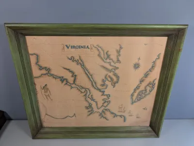 Sale Photo Thumbnail #14: Framed vintage-style Virginia map illustration featuring Chesapeake Bay and historical cartographic details, housed in a molded green wooden frame.