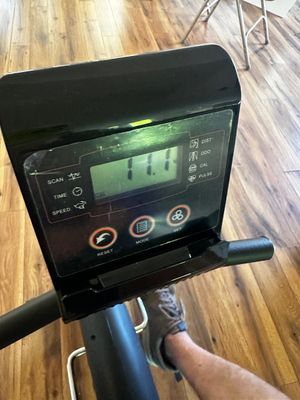 Sale Photo Thumbnail #22: Digital display console of a stationary exercise bike showing active LCD readout and control buttons.