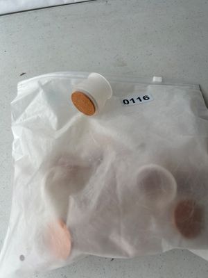 Sale Photo Thumbnail #177: Bag of clear flexible silicone furniture leg caps featuring integrated felt bottoms designed to protect floors and reduce noise. Includes multiple pieces stored in a ziplock bag labeled 0116. Appears to be in unused condition.