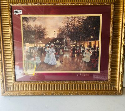Sale Photo Thumbnail #139: Framed art print depicting an elegant Victorian-era street scene with figures strolling near a fountain, surrounded by trees and illuminated streetlights. Features double matting with a burgundy outer mat and a inner gold trim accent. Housed in an ornate 