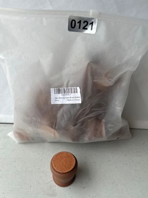 Sale Photo Thumbnail #182: A package containing 24 silicone chair leg covers/protectors in brown, size Medium, featuring felt bottoms to protect floors from scratches. Package is labeled '24pcs Chair Leg Covers (Brown, Medium)' and appears new in plastic bag packaging. One piece is