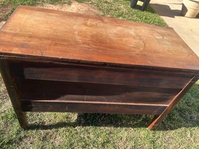Sale Photo Thumbnail #78: A vintage wooden chest featuring two long drawers with ornate metal brass-tone bail handles, keyhole accents, and French/cabriole style front legs. The surface shows age-appropriate wear, surface scratches, water rings, and finish loss throughout, consist