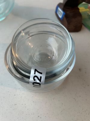 Sale Photo Thumbnail #27: Set of stacked clear glass prep bowls or containers. Appears to be in good condition without visible cracks or chips.
