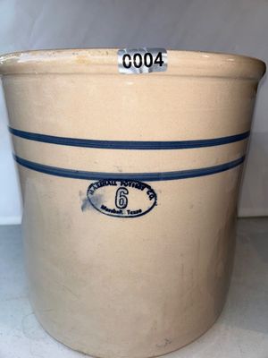 Sale Photo Thumbnail #4: Vintage Marshall Pottery Co. (Marshall, Texas) 6-gallon stoneware crock featuring blue double stripes and an oval blue maker's mark. Shows minor surface wear, scuffs, and slight rim wear consistent with age and use.