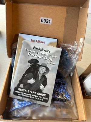 Sale Photo Thumbnail #21: Don Sullivan's Secrets to Training the Perfect Dog System complete training kit in original box. Includes Quick Start Guide booklet, instructional DVD, training collar components, and lead line.