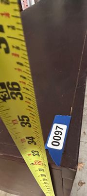 Sale Photo Thumbnail #138: A dark brown wood media console featuring multiple open cubbies and shelves for electronic components and media storage. Tape measure photos show approximate dimensions of 72 inches long, 16 inches deep, and 32 inches high. Shows light surface wear and sc