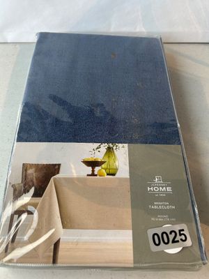 Sale Photo Thumbnail #25: A new in original sealed packaging JCPenney Home 'Brighton' round tablecloth in blue fabric. Measures 70 inches in diameter (178 cm).