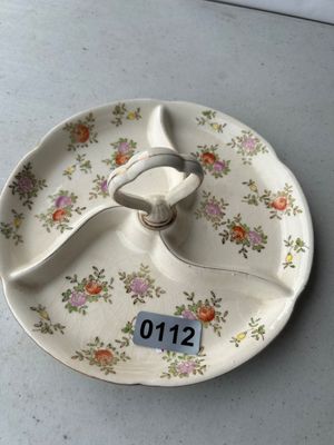 Sale Photo Thumbnail #171: A vintage ceramic/porcelain divided serving dish featuring three sections, a central loop handle, and hand-painted floral sprigs in shades of pink, orange, green, and yellow. Features light gold gilt accents along the handle and scalloped rim. Fine crazin