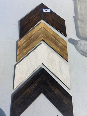 Sale Photo Thumbnail #52: A set of four modern rustic wooden chevron wall accents featuring various finishes including dark brown, natural wood tone, whitewashed light wood, and dark espresso wood grain.