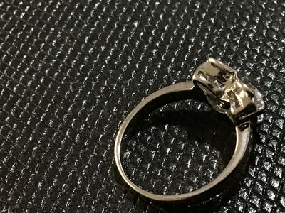 Sale Photo Thumbnail #75: 18 KtGPSilver-tone ring featuring a butterfly motif set with clear faceted stones forming the wings. Measures approximately size 6.5 on a ring mandrel. Shows minor surface wear consistent with light use.