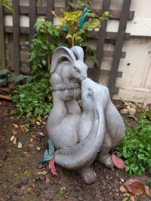 Sale Photo Thumbnail #25: Concrete nuzzling rabbits garden statue 