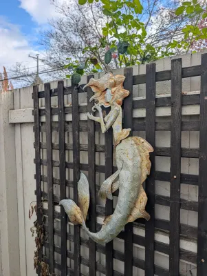 Sale Photo Thumbnail #23: mermaid wall sculpture