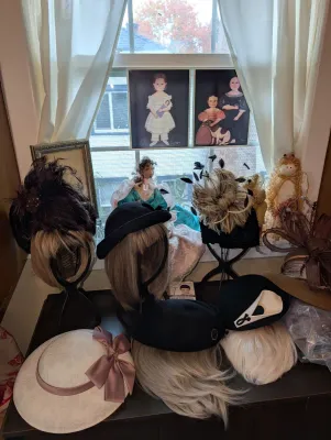 Sale Photo Thumbnail #5: Vintage-style women's hats, fascinators, and wigs, dolls and folk art prints.