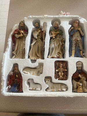 Sale Photo Thumbnail #22: Vintage ceramic Nativity set, complete with figures including the Holy Family, Wise Men, shepherd, and animals, stored in its original styrofoam packaging.