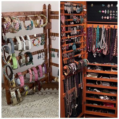 Sale Photo Thumbnail #3: Large collection of costume jewelry, wristwatches, and fashion accessories displayed on a wooden stand and inside a standing wooden jewelry armoire cabinet.