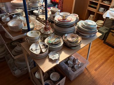 Sale Photo Thumbnail #108: Large collection of vintage dishware, teacups, saucers, and serving pieces displayed on shelving and tables.