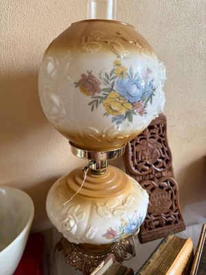 Sale Photo Thumbnail #12: Vintage Gone with the Wind style hurricane lamp featuring hand-painted floral motifs on embossed milk glass with brass-tone hardware.