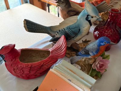 Sale Photo Thumbnail #64: Collection of vintage bird decor, including painted ceramic bird-shaped planters and porcelain figurines.