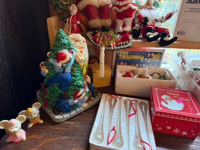 Sale Photo Thumbnail #139: Collection of vintage Christmas decorations, including Santa figurines, glass icicle ornaments in original packaging, mouse figurines, and a craft kit.