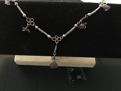 Sale Photo Thumbnail #53: Artisan handmade wire-wrapped necklace featuring purple amethyst chip accents, clear tube beads, silver-tone wire scroll motifs, and a central teardrop agate or amethyst cabochon pendant. Finished with an S-hook clasp. Measures approximately 16-18 inches 