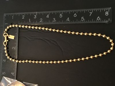 Sale Photo Thumbnail #75: Authentic Coach brass ball bead chain featuring a brass trigger snap hook and a stamped metal 'COACH' hangtag charm. Measures approximately 16 inches long end-to-end (doubled over to around 8 inches as shown with ruler). In good vintage pre-owned conditio