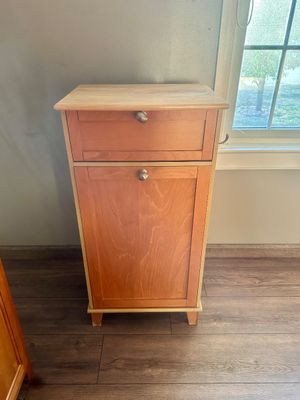 Sale Photo Thumbnail #24: Contemporary wooden trash bin cabinet with top drawer and brushed metal knobs.