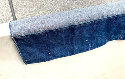 Hand-crafted 2-sided denim pocket tool pouch which hangs over a saw horse or similar