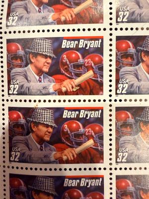 Sale Photo Thumbnail #3: Sheet of 1997 USA 32-cent postage stamps honoring legendary college football coach Bear Bryant.