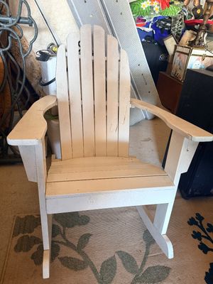 Sale Photo Thumbnail #53: White painted wooden Adirondack rocking chair with slatted back, showing light surface wear.