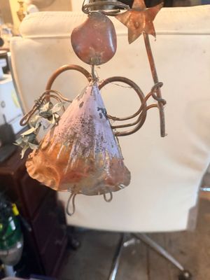 Sale Photo Thumbnail #58: Handcrafted copper and metal angel ornament holding a star wand, featuring distressed painted accents and wire wings.