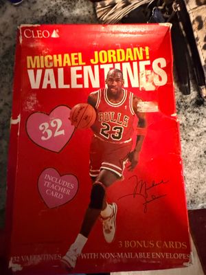 Sale Photo Thumbnail #29: Vintage 1990s Cleo Michael Jordan Valentines card box featuring 32 classroom valentines and envelopes. The box shows some edge wear and creasing.