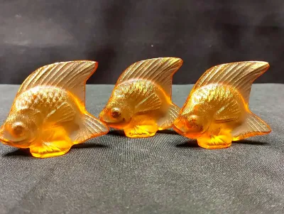THREE AMBER LALIQUE CRYSTAL FISH WITH 24K GOLD EMBELLISHMENTS 