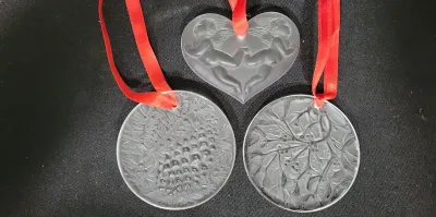 THREE LALIQUE CRYSTAL ORNAMENTS 