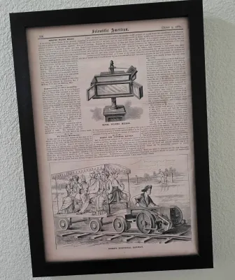 Sale Photo Thumbnail #75: Framed original page from Scientific American dated June 5, 1880, featuring illustrations and articles on a novel folding mirror and Edison's electrical railway.