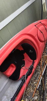 Sale Photo Thumbnail #24: Red Pelican sit-in kayak with padded seat and front storage hatch.