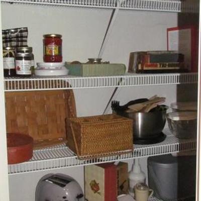 Pantry showing miscellaneous appliances, cookware, baskets, etc.
