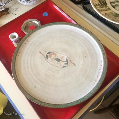 Hand-thrown and decorated ceramic dish