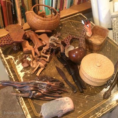 Some baskets and carved African animal figures