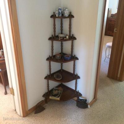 Corner shelf with collectibles