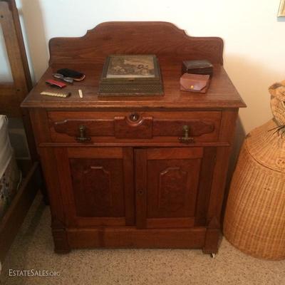Antique washstand with original bib and hardware