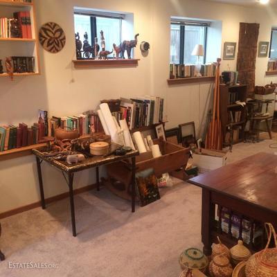 Animal figures carved from wood and stone from Africa. Also many books and posters