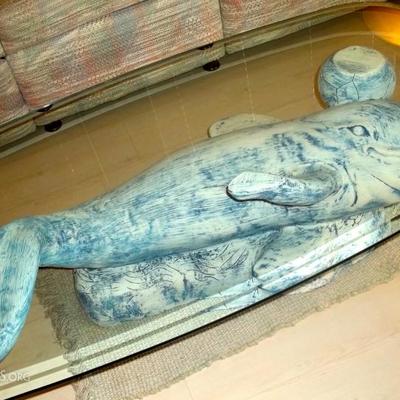 Glass top Porpoise base coffee table.