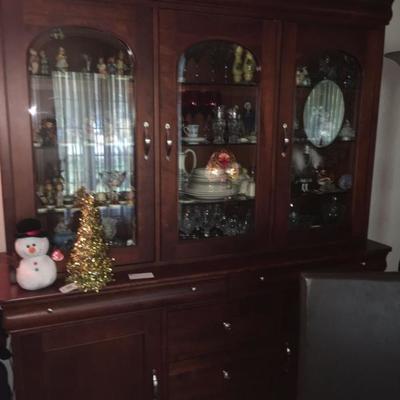Newer style china cabinet with "touch lighting" feature. 