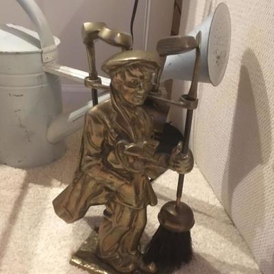 small golf-themed fireplace tools