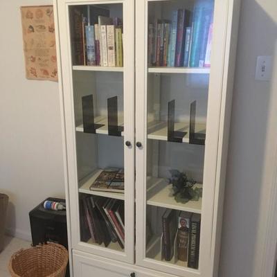 white bookcase w/ glass doors