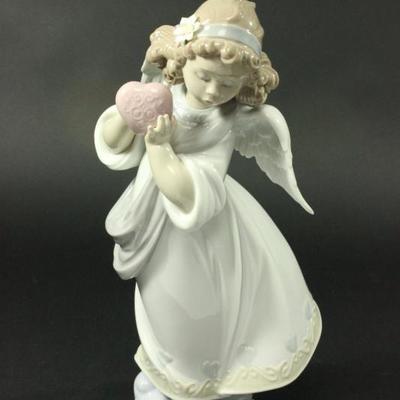 Lot 51: Lladro Porcelain Figure "Love in the World" 