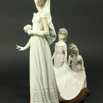 Lot 56: Lladro Porcelain Figurine "Here Comes the Bride" 