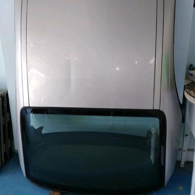 Hardtop for Porsche 911. 996 series convertible. Crease in top.