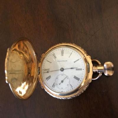 Vintage 14K Gold Pocket Watch.  Hand cut design of flowers, leaves, and birds.  That case is completely hand tooled.  It has white,...