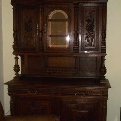 Coup de Gras Beautiful Antique Buffet. 8 ft. tall
Comes apart in 5 pieces for moving. Top section can be removes for shorter wall.